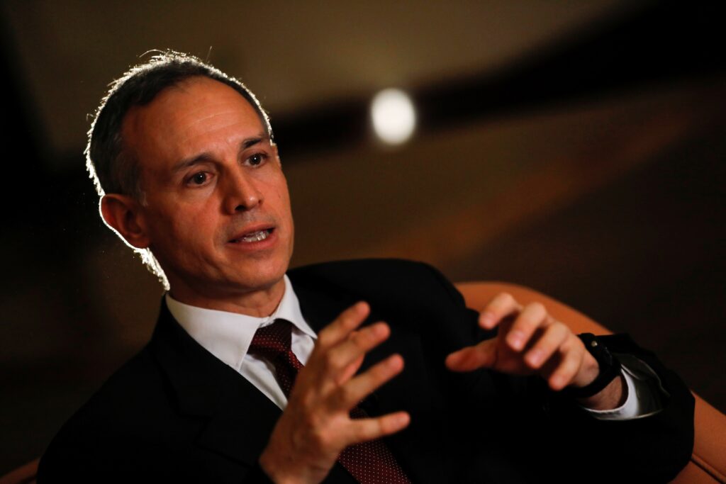 Mexico's deputy Health Minister Hugo Lopez-Gatell gestures as he speaks during an interview with Reuters in Mexico City